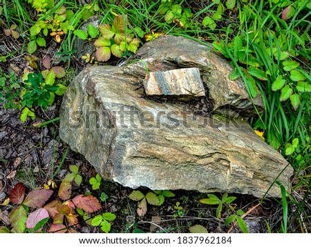 stones in the forest in the foothills of the Urals near lake Uvildy