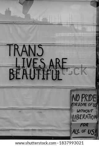 Trans lives are beautiful sign on a bookshop's window