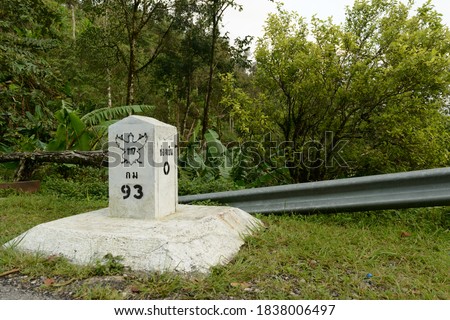 The 93rd milestones of National Highway number 1117, Translation Thai text “Chong Yen distance 0 Kilometers" Mae Wong National Park, Kamphaeng Phet, Thailand.