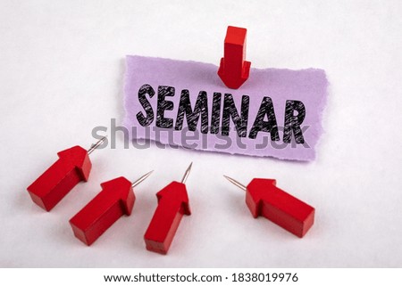 SEMINAR. Distance learning, courses and in-service training concept. Red arrows on a white background