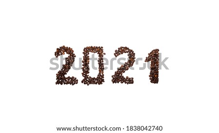 2021 laid out from coffee beans on a white background. christmas coffee house concept