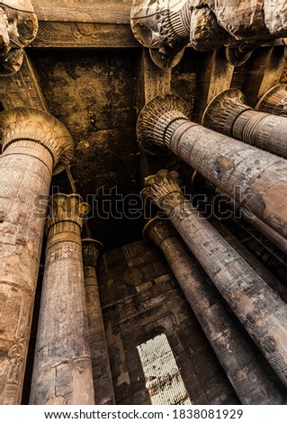 Columns and hieroglyphs in the Temple of Khnum at Esna stock photo
