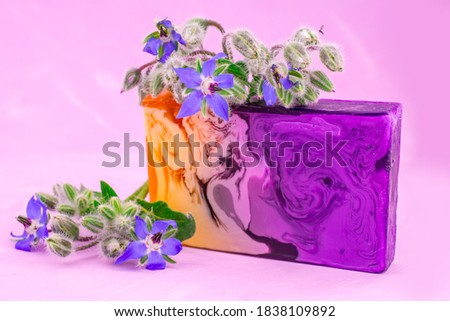 colorful background with  borage  flower  and soap