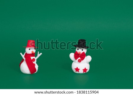 christmas snowmen on color background