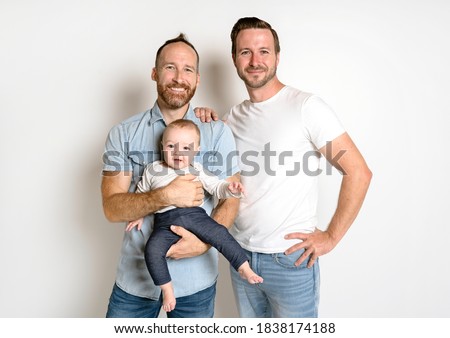 gay or homosexual male couple with their daughter baby over white background Royalty-Free Stock Photo #1838174188