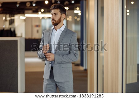 Perfect down to the smallest detail. Modern businessman. Fashion shot of a handsome young man wearing an elegant classic suit. Men's beauty, fashion. Royalty-Free Stock Photo #1838191285