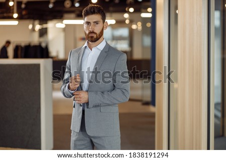 Perfect down to the smallest detail. Modern businessman. Fashion shot of a handsome young man wearing an elegant classic suit. Men's beauty, fashion. Royalty-Free Stock Photo #1838191294