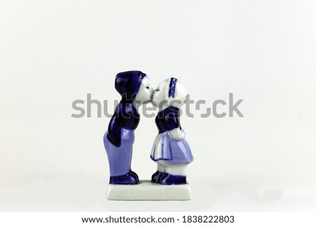 Porcelain figurine of a boy and a girl
