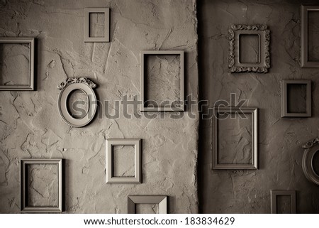 Blank Empty  Photo Frames on a  rough Grungy Background 