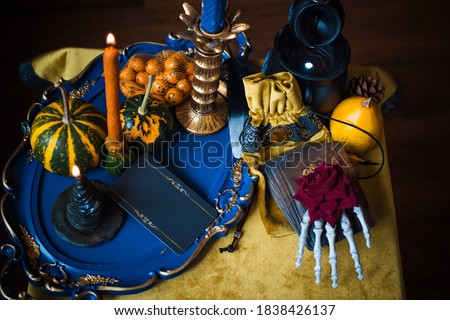 Halloween composition, mystical design for home, with stuff, interesting decor