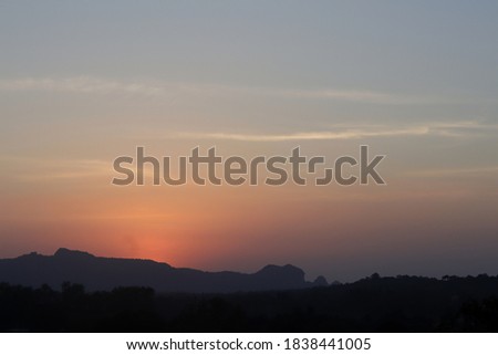 Landscape of the sunset in Panchmarhi, Madhya Pradesh with selective focus. Beautiful sunset on the mountains in India with copy space. 