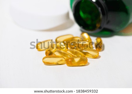 dietary supplement - fish oil capsules, closeup