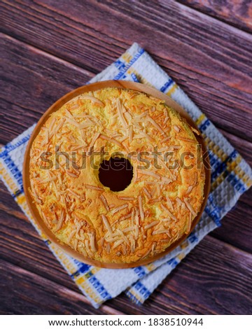 cheese chiffon cake, a super soft and cottony cake made from cream cheese, lemon juice, vegetable oil, milk, sugar, flour, and separated eggs, and topped with grated cheddar cheese