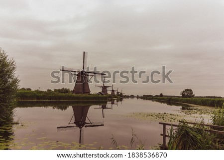 Dutch picture. Beautiful windmills with reflection