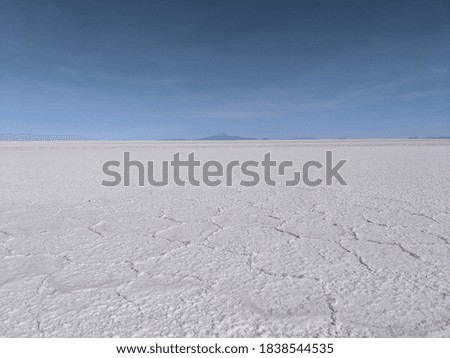 salt flat with mountain background