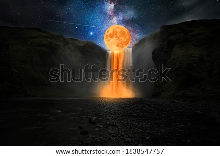 Orange moon over great waterfall Royalty-Free Stock Photo #1838547757