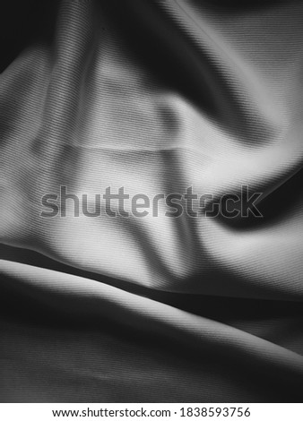 Soft fabric texture black and white grainy film photography