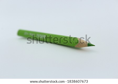 photo of an isolated green pencil