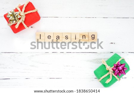 Global Leasing Day. word leasing and gift boxes photo