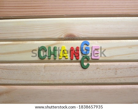 Word Change and Chance arranged on wood background