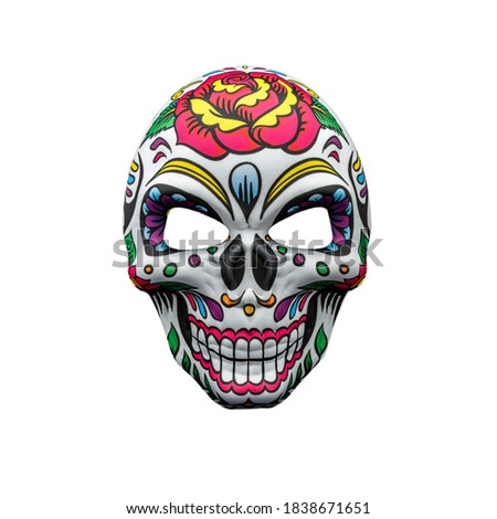 Halloween mask representing a traditional mexican skull with colorful floral pattern isolated on a white background. 