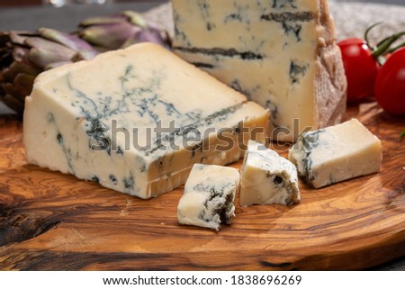Cheese collection, Italian gorgonzola cheese made from unskimmed cow milk in Piedmont and Lombardy close up Royalty-Free Stock Photo #1838696269