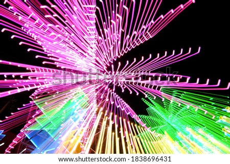 Abstract illuminated background, light shining pattern, many colors, technique zoom effect, for celebration chirsmast and happy new year