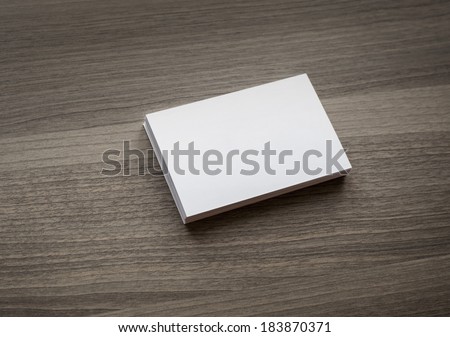Blank a stack of b-cards on a wooden texture