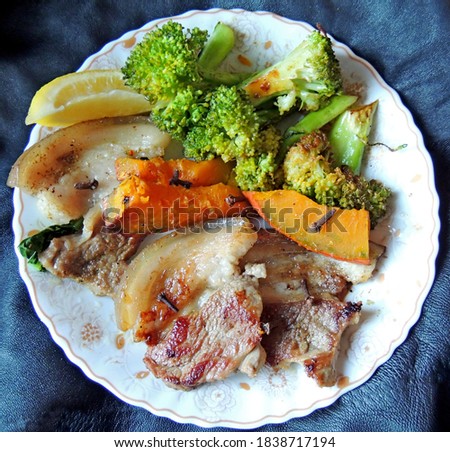 Broccoli, bacon and baked pumpkin. Healthy food