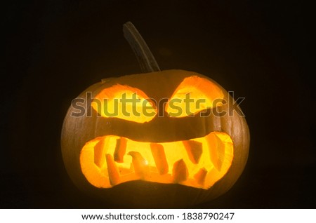 Helloween pumpkin on dark background