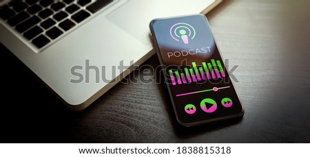 Podcast Radio Streaming Mobile application interface. Listening to Podcasting Radio Services on smartphone. Podcast microphone icon with equalizer and play bar icons. Interviews, audio and music, news Royalty-Free Stock Photo #1838815318