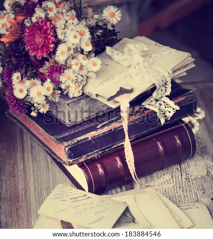 Vintage Albums with Photos of Memories,flowers,letteres and key/ toned image nostalgic vintage background