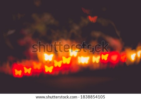illuminated glittering bokeh red, yellow, blue, purple copy space background
