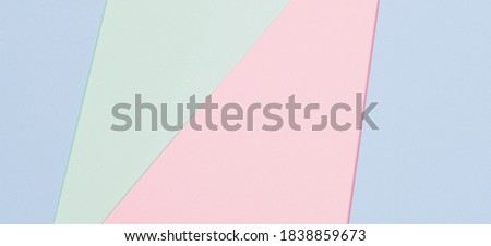 Abstract colored paper texture background. Minimal geometric shapes and lines in blue, light green, pastel pink colours