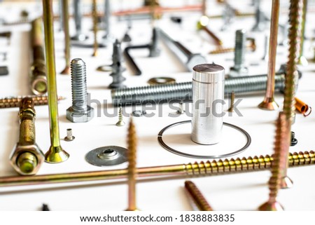 Screws and washers on white background