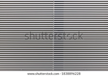  Metal Bars as a Background. Texture of ventilation grille for air intake in office building. Jalousie. Background. Stripes Royalty-Free Stock Photo #1838896228