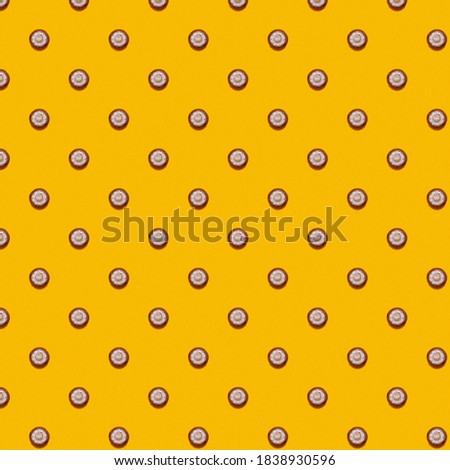 Champignon mushroom pattern on a yellow background, flat lay. Top view. 