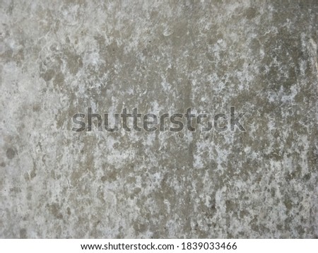 The old bare cement wall