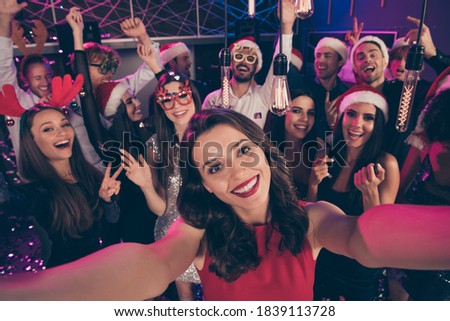 Photo of positive funny people shoot selfie girl show v-sign have fun enjoy dance floor modern club indoors