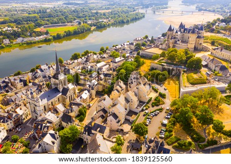 Aerial view of the city of Saumur and medieval castle Saumur on the banks of the Loire river. France Royalty-Free Stock Photo #1839125560