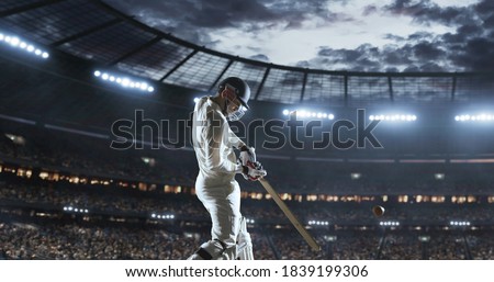 Cricket player in action on a professional stadium. Stadium is made in 3d.