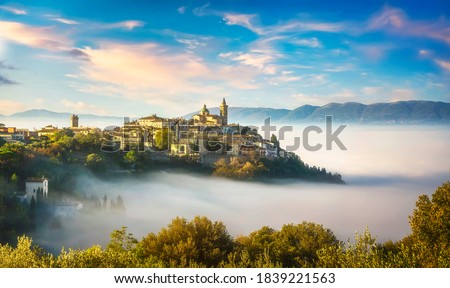 Trevi picturesque village in a foggy morning. Perugia, Umbria, Italy, Europe. Royalty-Free Stock Photo #1839221563