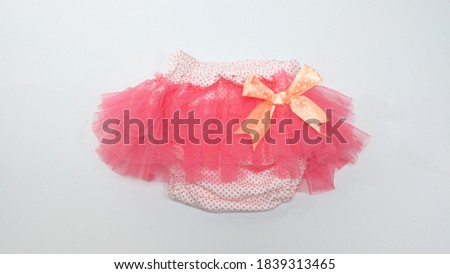 fluffy pink skirt on a white background. pink skirt for girl