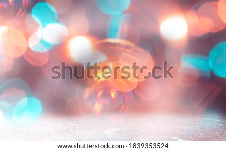 Holiday evening and party lights. Glitter vintage lights background. Defocused bokeh effect. Backgrround, wallpaper for advertisement or design, device. Copyspace. Magical shimmering.