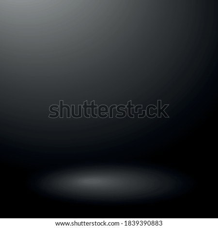 Black panoramic studio background with white glow