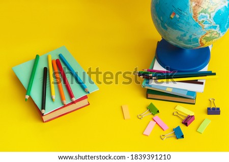 Flat lay photo with school supplies. Back to school concept. Writing subjects.