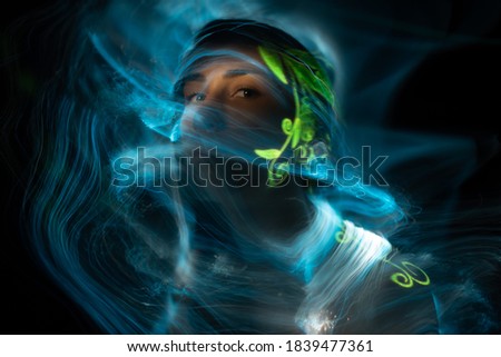 Portrait in the style of light painting. Long exposure photo
