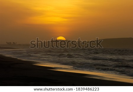 Sun setting behind the great dune of Jericoacoara beach, near Fortaleza, Ceara State, Brazil on April 23, 2005.