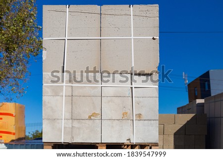 Sale of bricks for construction. Wholesale base of building materials. Background