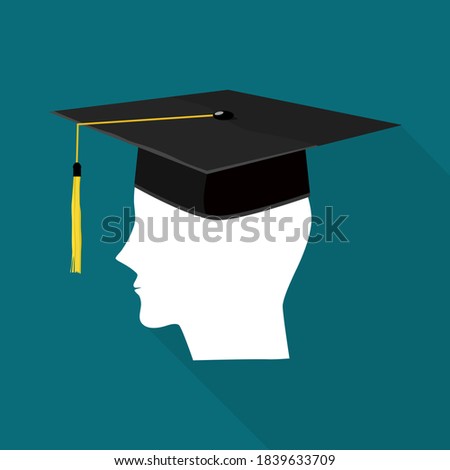 The head of the person wearing a graduation hat. Educational success concept